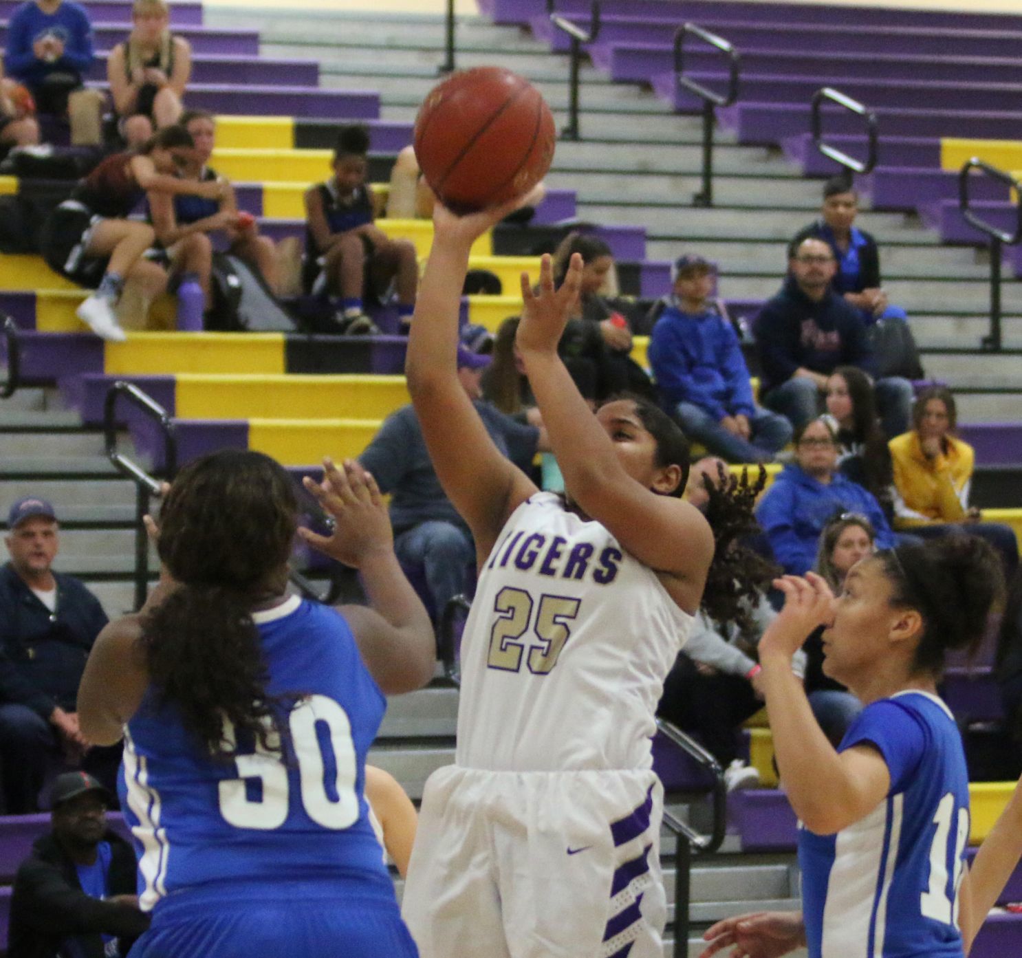 Tigers outshoot Huskies in the fourth